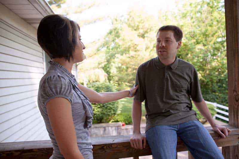Two people talking