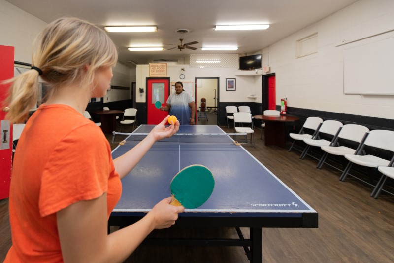Two patients playing table tennis at White Deer Run of Allenwood