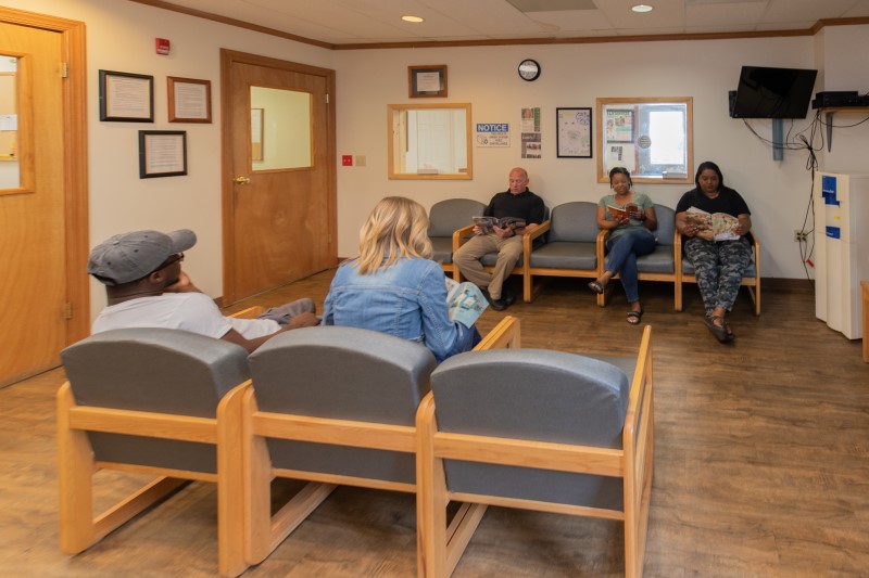 Patients sit in a waiting room at White Deer Run of Allenwood